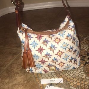 Dooney and bourke disney passport collection bag